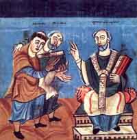 Raban Maur (left), flanked by Alcuin (middle), dedicates his work to Archbishop Otgar of Mainz (Right), taken from a Carolingian manuscript (ca. 831/40) currently residing in the Österreichische Nationalbibliothek Wien. (View Larger)