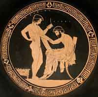 One of the earliest surviving images of anyone reading a papyrus roll, preserved in the Louvre. (View Larger)